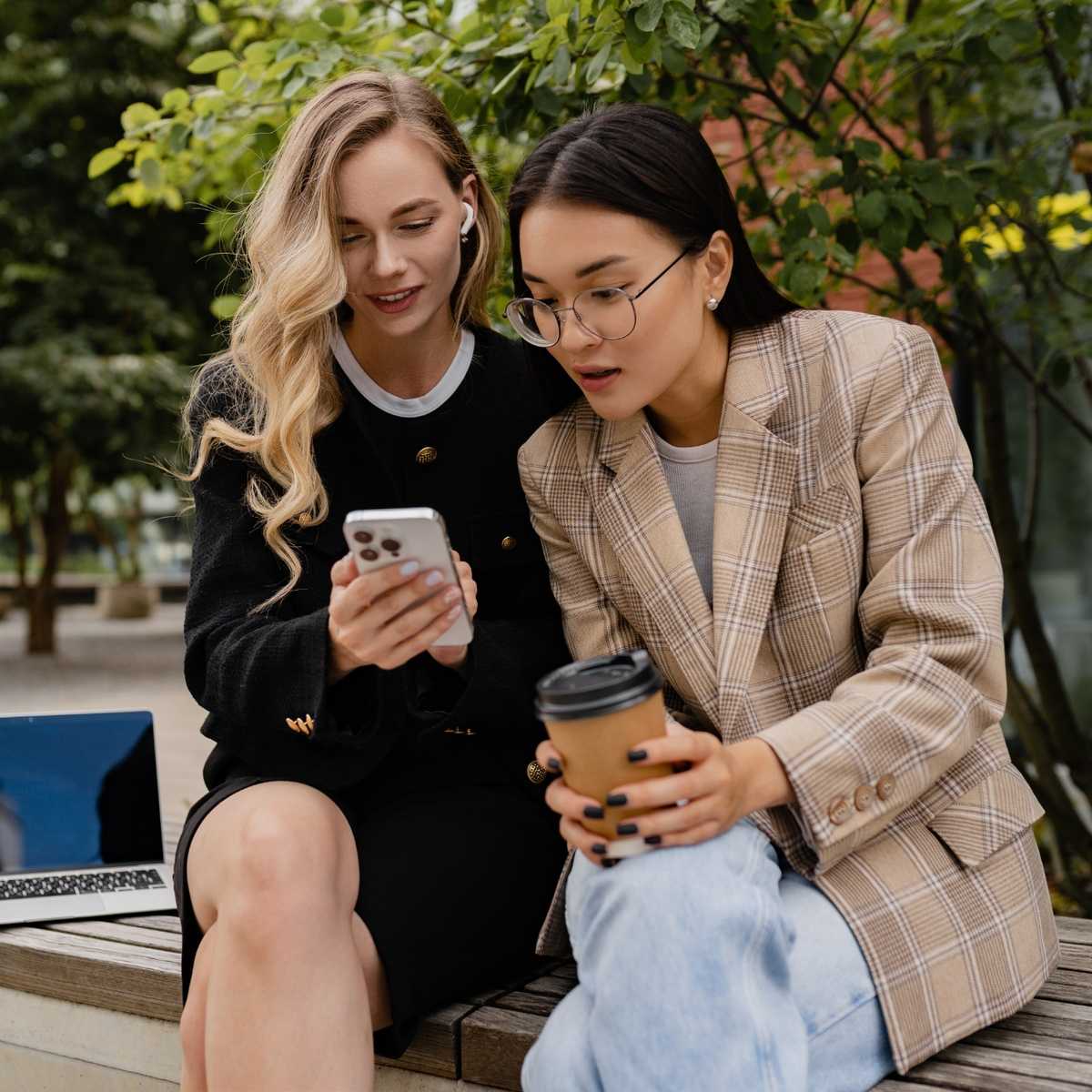 people looking at a phone