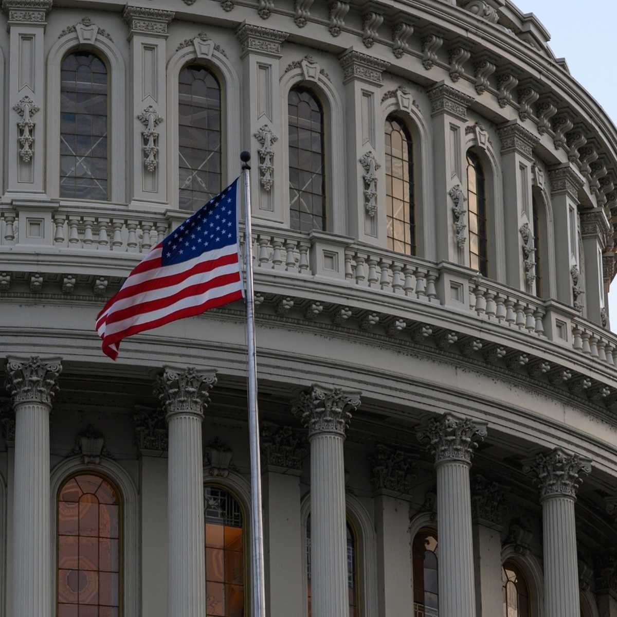 capitol building with american flag