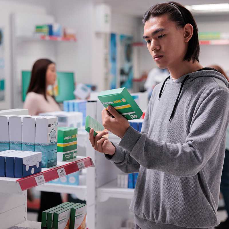 Young man at the pharmacy