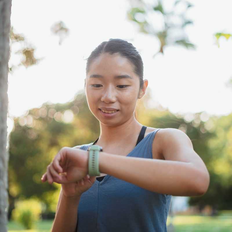 Woman looking at her smartwatch