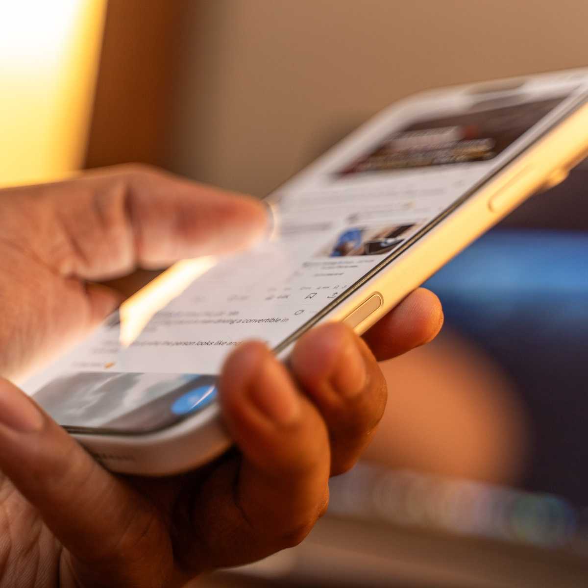 person scrolling news feed
