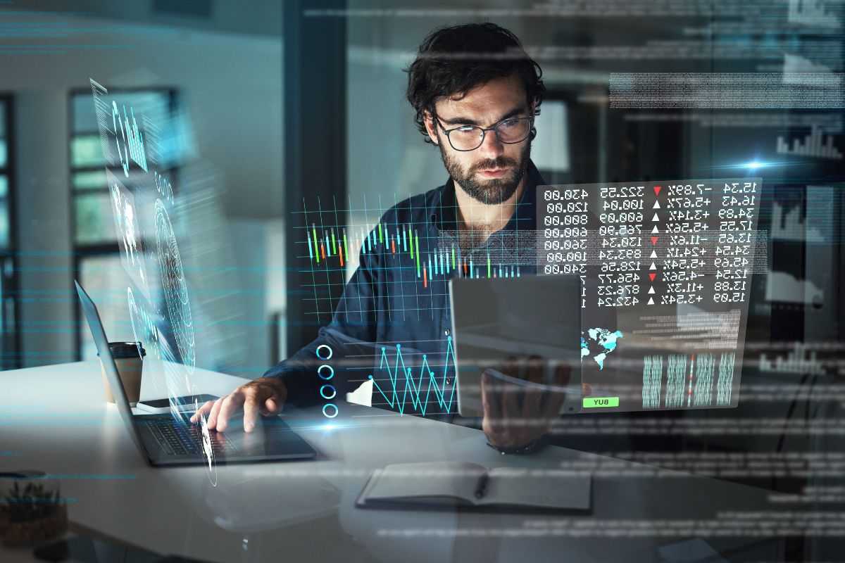 Man looking at data on hologram screen