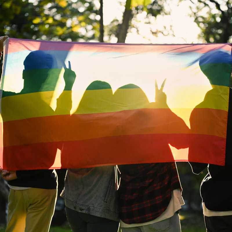 Group of people with pride flag