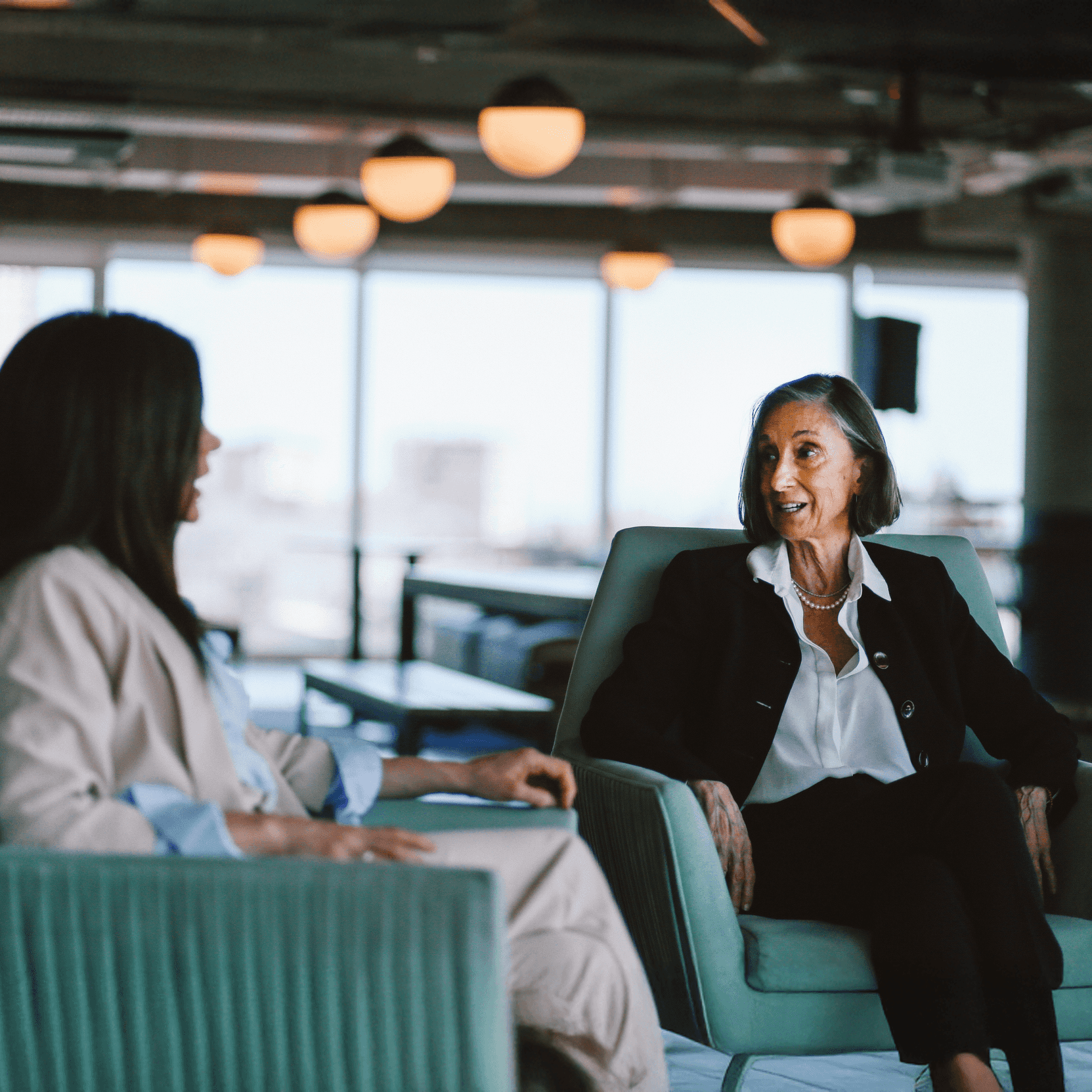 Business women speaking